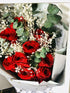 9 Red Kisses Floral Bouquet.